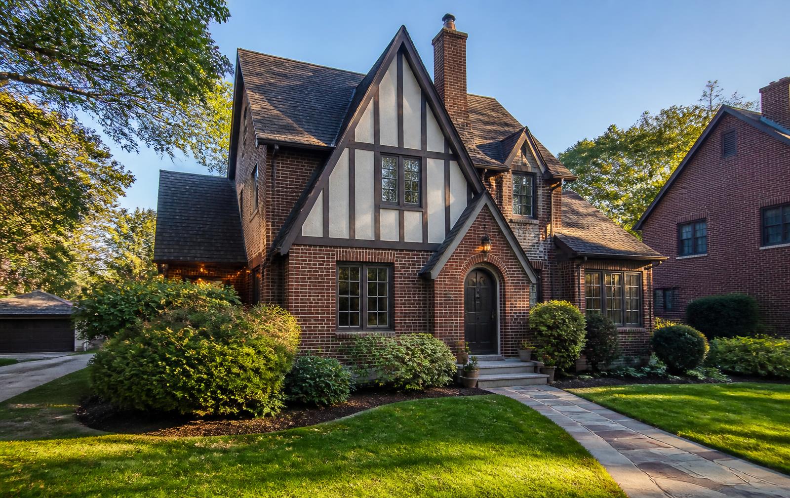 Tudor Revival brick house with half-timbered gable in Charlotte
